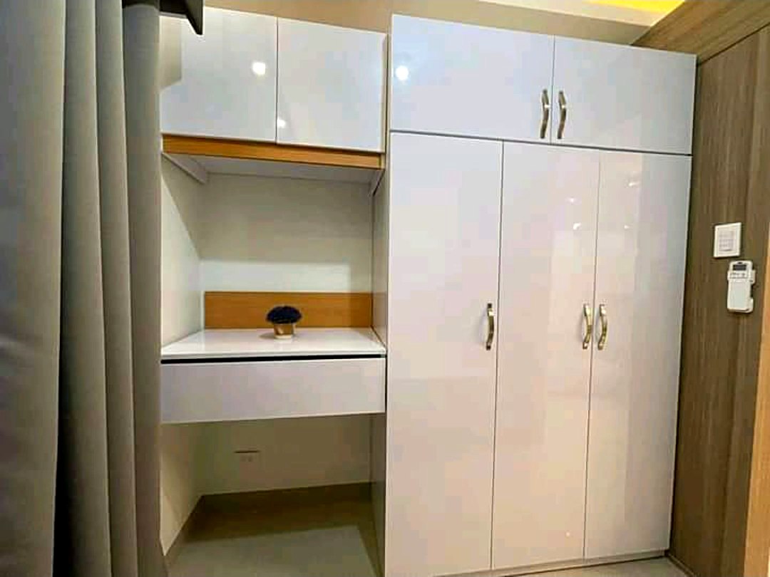 Gloss white wardrobe and dresser nook