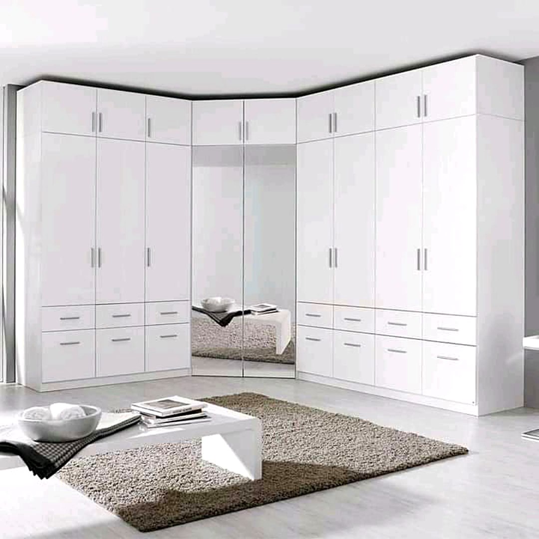 White corner wardrobe with mirror